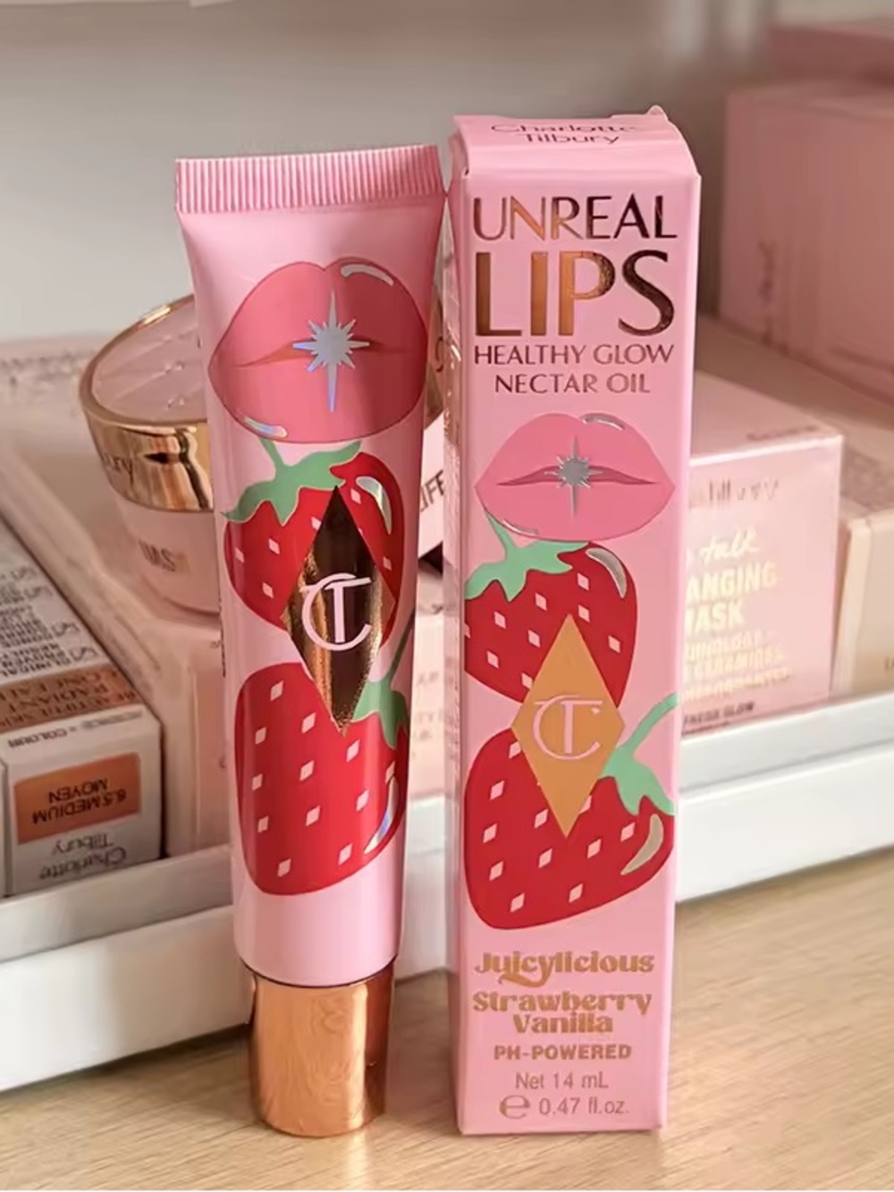 Charlotte Tilbury Unreal Lips Juicylicious Strawberry Vanilla Lip Oil - Clear